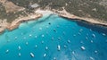 Cala Saona in Formentera island and many boats over turquoise sea . Royalty Free Stock Photo