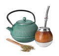 Calabash, bombilla, teapot and spoon with mate tea on white background