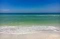 White sand beach with blue green waves in Caladesi island Royalty Free Stock Photo