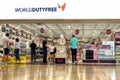 Calais, France - August 12 2018: Shoppers browsing alcoholic drinks, tobacco and perfume in the World Duty Free shop