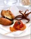 Calamary,zucchini and cherry tomato Tempuras Royalty Free Stock Photo
