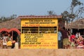 Rates for water sports advertised on the yellow wall of the Calangute Water Sports