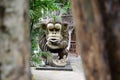 Huge concrete carved monkey statue in an Asian aquatic jungle theme park