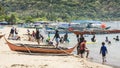 Calayo, Batangas, Philippines - A crowd of domestic tourists flock the beach during the weekend to beat the heat and