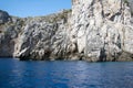 Calcareous and jagged rock. Crag.