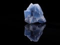 Calcite blue close-up. Black background. Macro image. Royalty Free Stock Photo