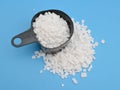 Calcium chloride on blue background Royalty Free Stock Photo