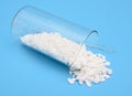 Calcium chloride on blue background Royalty Free Stock Photo