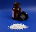 Calcium chloride on blue background Royalty Free Stock Photo