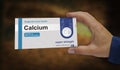 Calcium tablets box pack in hand 3d illustration