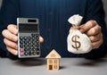 Calculate the cost of a mortgage on a house. Royalty Free Stock Photo