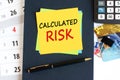 calculated risk - text on yellow paper on blue background, concept Royalty Free Stock Photo