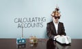 Calculating accounts text with vintage businessman at office