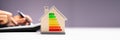 Calculating Energy Efficient House Consumption Royalty Free Stock Photo