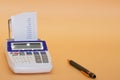 Calculating machine isolated on a neutral background Royalty Free Stock Photo