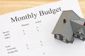 Calculating your monthly budget with a house Royalty Free Stock Photo