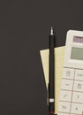 Calculator, adhesive note and pen Royalty Free Stock Photo