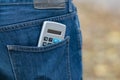 Calculator in a back jeans pocket Royalty Free Stock Photo