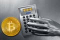 Calculator with bitcoin btc coin and futuristic hand