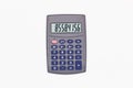Calculator with blue buttons with numbers on the digital screen on a white background. Isolated. Solar powered financial Royalty Free Stock Photo