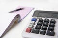 Calculator and books on white Royalty Free Stock Photo