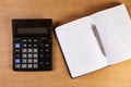 Calculator and business organizer, notebook or planner with a bolpoint pen Royalty Free Stock Photo