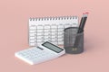 Calculator, calendar and pencils in holder. Back to school concept