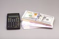 Calculator with dollar and euro notes Royalty Free Stock Photo