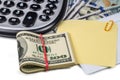 Calculator, dollars, envelope and paper for notes Royalty Free Stock Photo