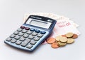 Calculator, Euro Notes And Euro coins isolated on white Royalty Free Stock Photo