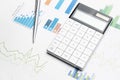 Calculator on financial statement and balance sheeet on desk of auditor. Concept of accounting and audit business Royalty Free Stock Photo