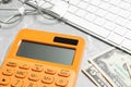 Calculator, glasses, keyboard and money on marble table. Tax accounting Royalty Free Stock Photo