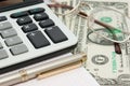 Calculator, glasses, notepad and money Royalty Free Stock Photo