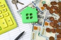 Calculator, house model, keys and money. Real estate agent`s workplace Royalty Free Stock Photo