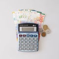 Calculator, Israeli Shekel Notes And coins isolated on white Royalty Free Stock Photo