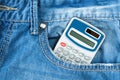 Calculator in jeans pocket Royalty Free Stock Photo