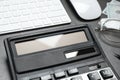 Calculator and keyboard on dark grey table, closeup. Tax accounting Royalty Free Stock Photo