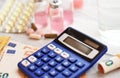 Calculator, medicines and euro bills Royalty Free Stock Photo