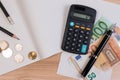 Calculator money, pencil, coin and paper note for saving money and business account. Royalty Free Stock Photo