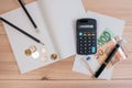 Calculator money, pencil, coin and paper note for saving money and business account. Royalty Free Stock Photo