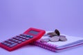 A calculator on the notebook and the next money Royalty Free Stock Photo