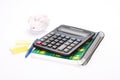 Calculator, notebook, pen, and stickers isolated on a white background Royalty Free Stock Photo