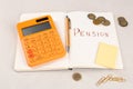 Calculator, notebook with word Pension, pen, coins, sticky note and paper clips on light gray table. Retirement concept Royalty Free Stock Photo