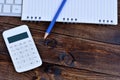 Calculator with notepad and keyboard pc on desk Royalty Free Stock Photo