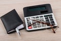 Calculator, notepad, pen and glasses on table Royalty Free Stock Photo