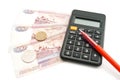 Calculator, pen, banknotes and coins Royalty Free Stock Photo