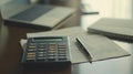 Calculator, Pen, and Documents for Business Analysis on an Office Desk Royalty Free Stock Photo