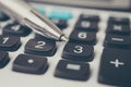 Calculator and pen. Finance and money investment concept Royalty Free Stock Photo