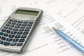 Calculator, pen, and papers ready for auditing Royalty Free Stock Photo