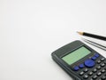 Calculator,pen and pencil on white background Royalty Free Stock Photo